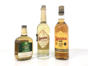 imagem dos três rótulos que receberam a indicação de cachaça do ano